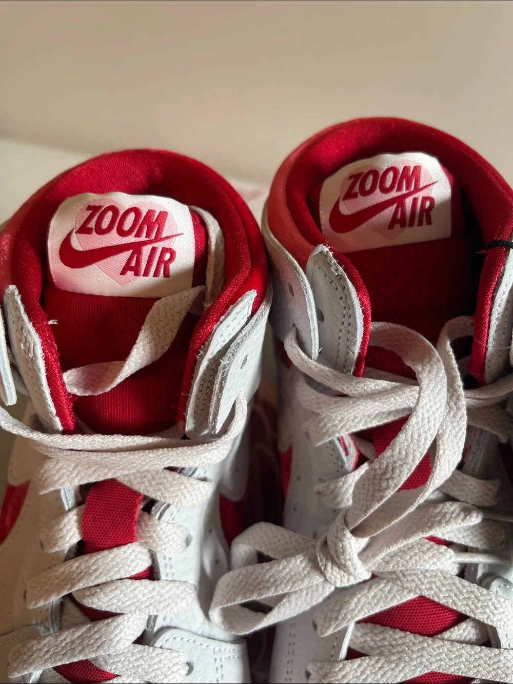 Jordan Women’s High-Top Sneakers in White and Red